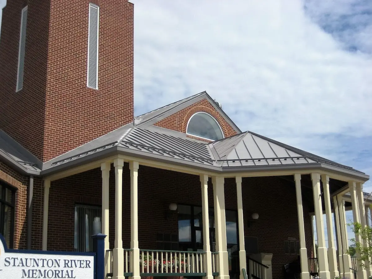 Skilled roofing craftsmen working on a residential roof in Indiana